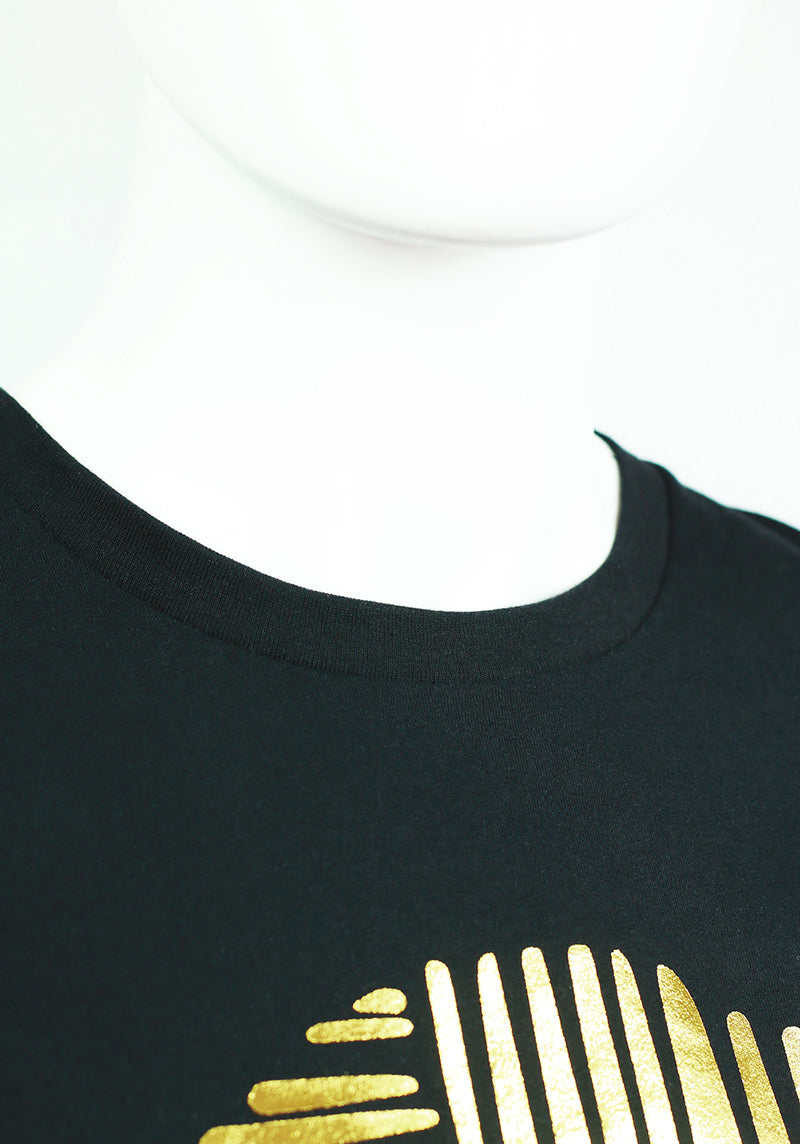 Collar of black t-shirt with gold foiled geometric face design