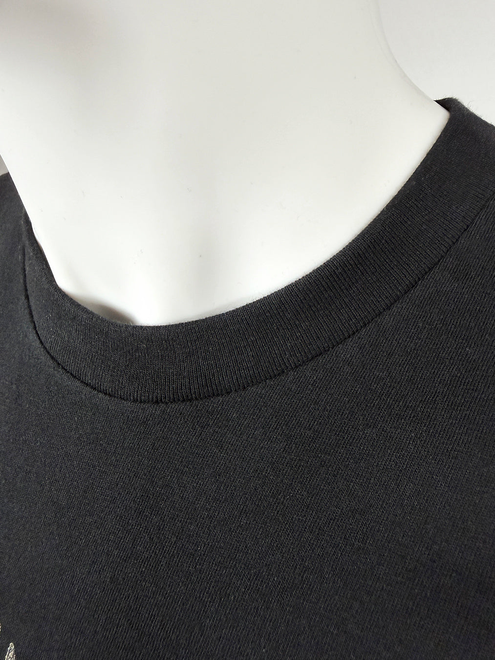 Black t-shirt with glitter printed head design  